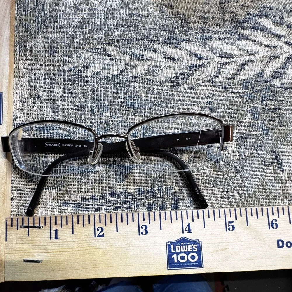 Coach Black and Gold Eyeglasses with white rectangular Logo C Case